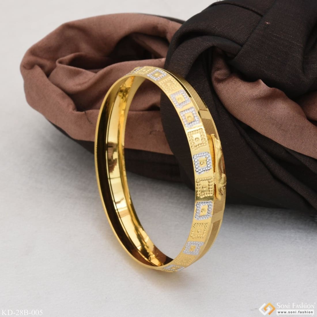 Designs of gents gold on sale kada