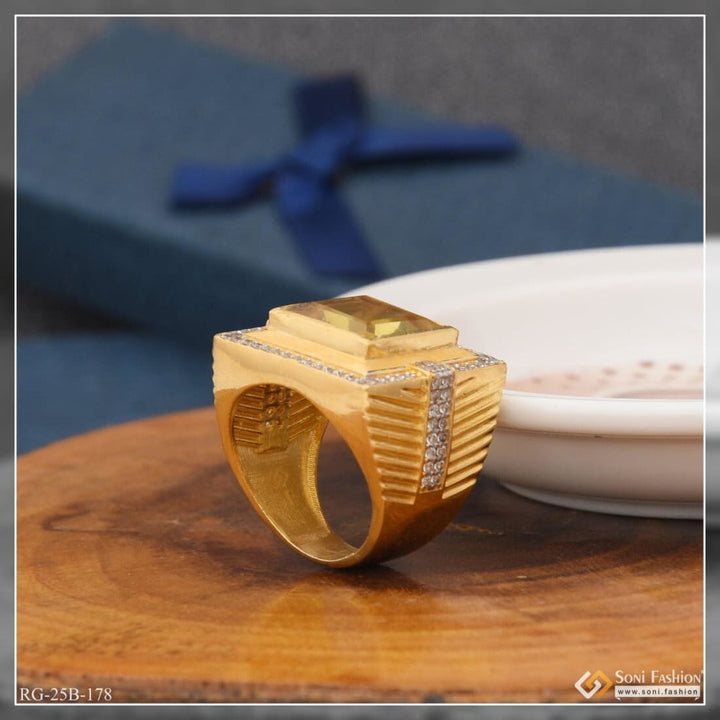 Gold ring with diamonds on wooden table - 1 Gram Gold Plated Yellow Stone With Diamond Ring For Men