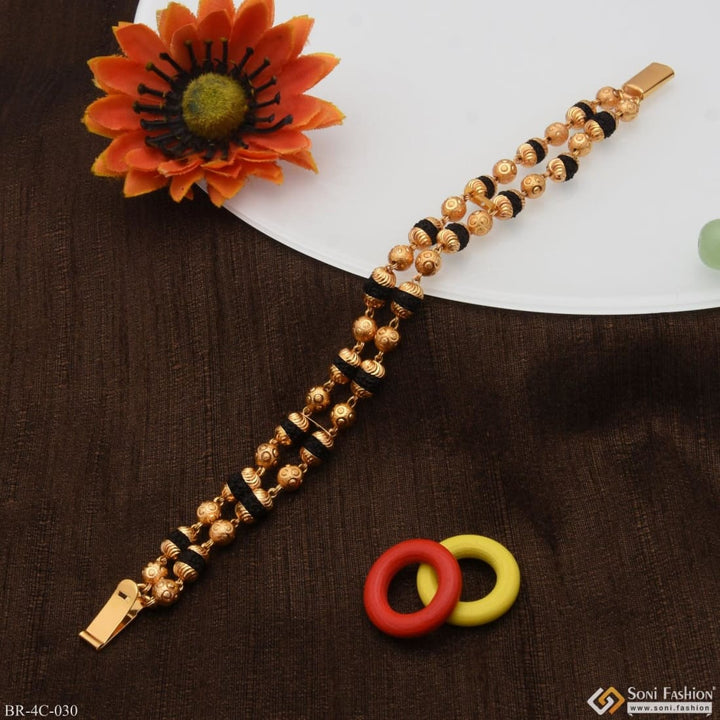 2 line attention-getting design gold plated rudraksha