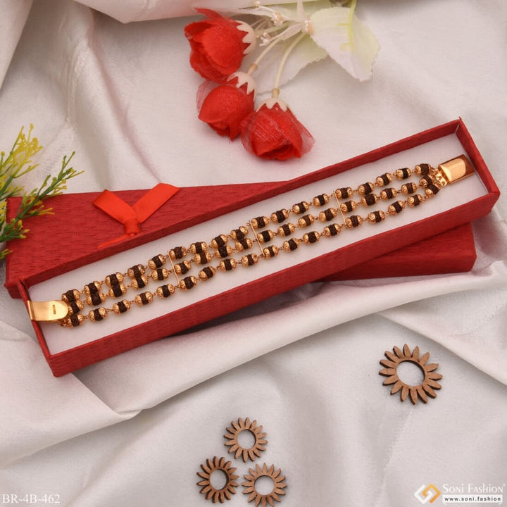 Red wooden jewellery box with gold plated beads for 3 Line Rudraksh Superior Quality Gold Plated Bracelet - Style B462.