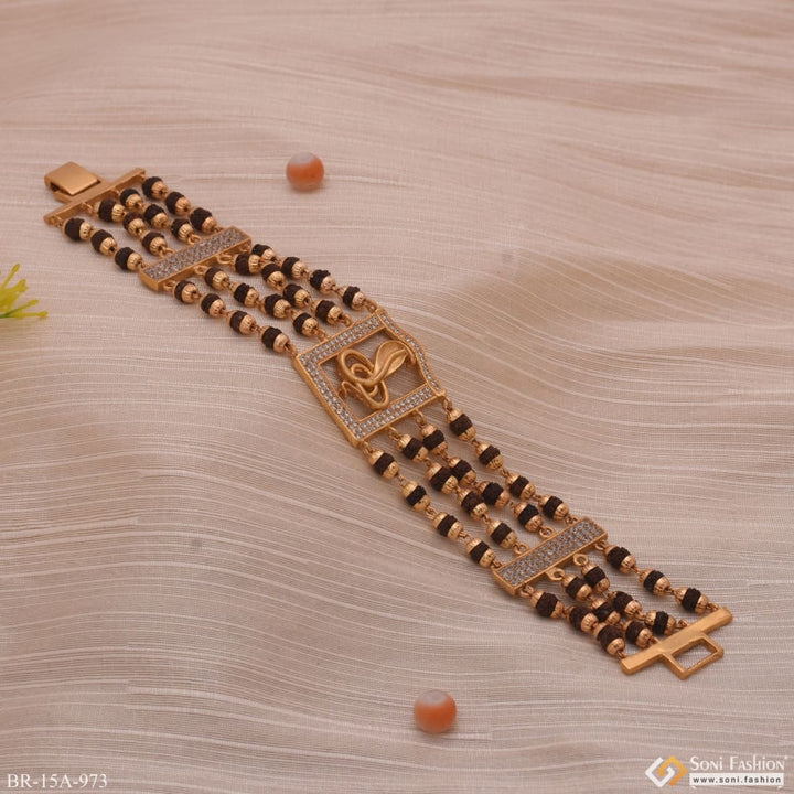 Gold bracelet with Goga Maharaj logo - 4 Line Rudraksha Bracelet A973