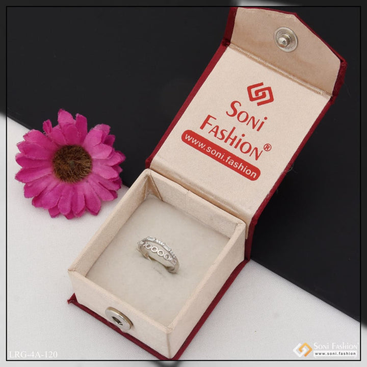 Sterling silver ring with diamond detail in box and flower