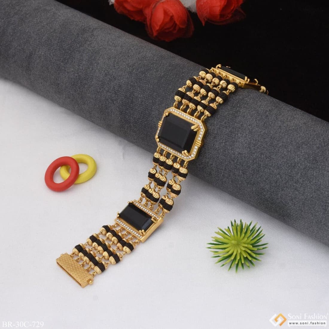Alexander McQueen Black Gold Skull Rubber Bracelet for Men Online India at  Darveys.com
