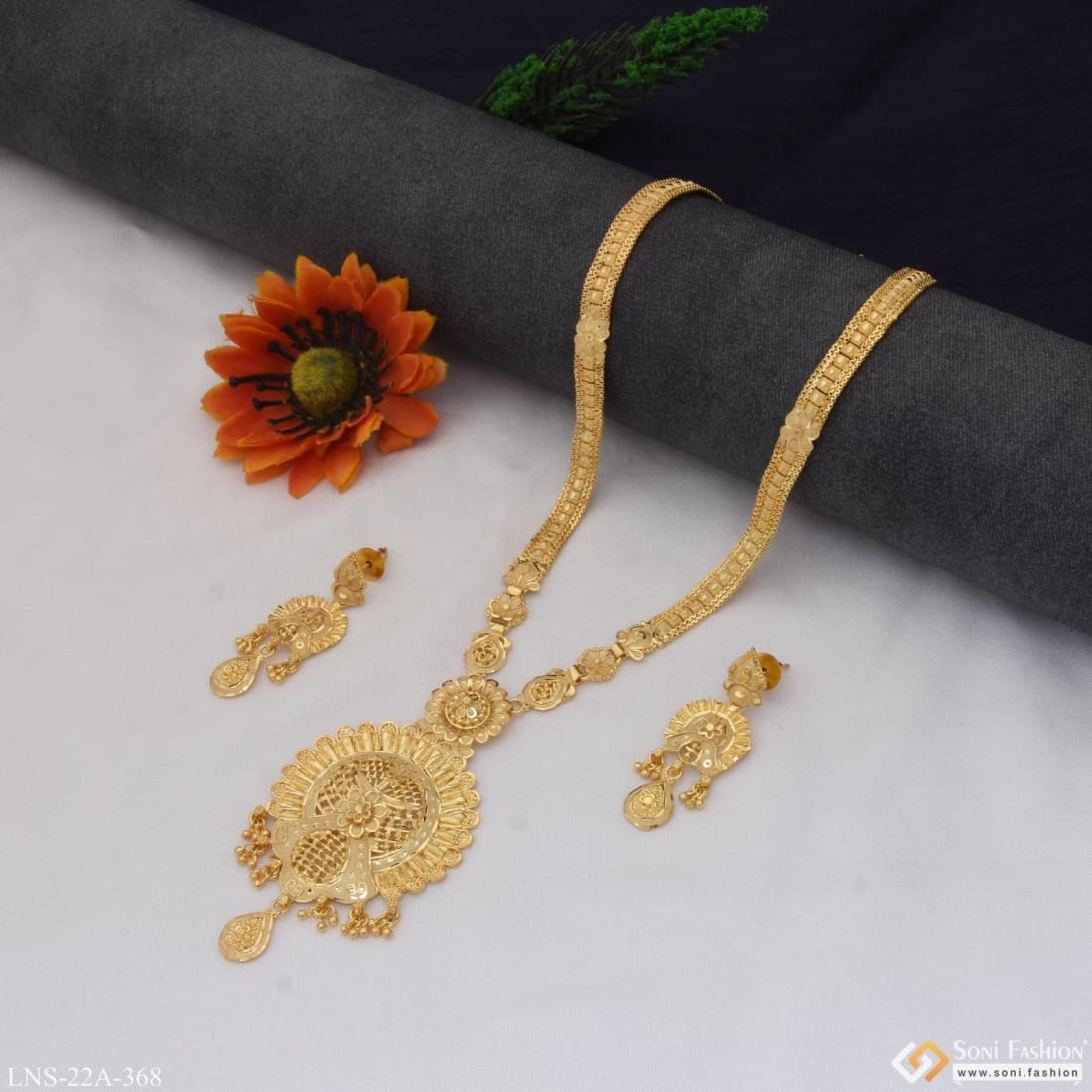 Long gold fashion on sale necklace