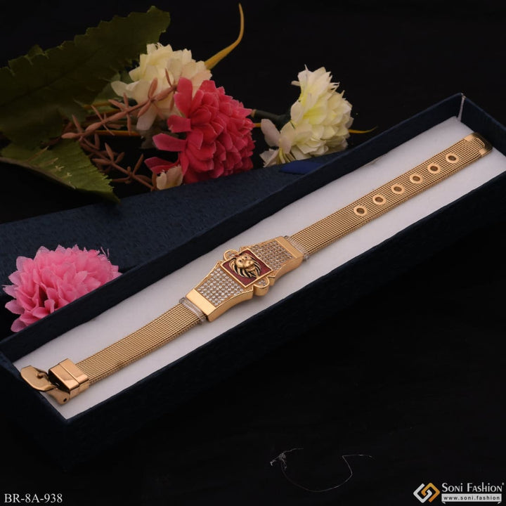 Gold plated stainless steel bracelet with diamond clasp - red background