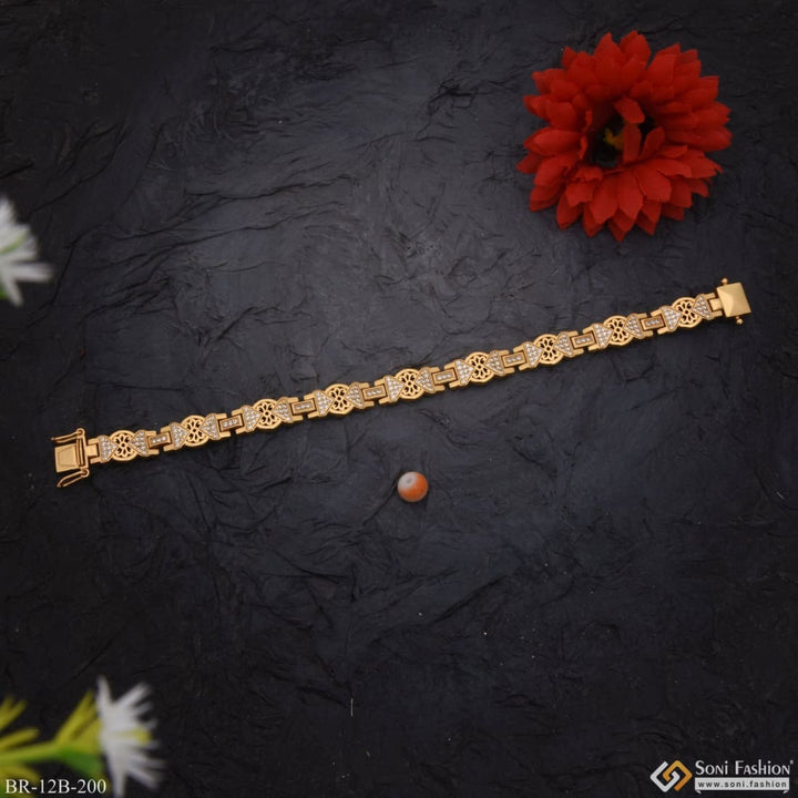 Gold Bracelet with Flower and Red Diamond Decorative Design