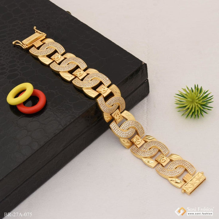 Gents gold plated c into exciting design om bracelet