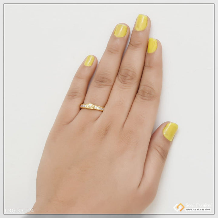 Heart with Diamond Eye-Catching Design Gold Plated Ring for Ladies - Style LRG-124 featuring woman’s hand with yellow nails and gold ring