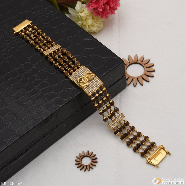 Gold plated Krishna bracelet with black and white stone display - Style B167