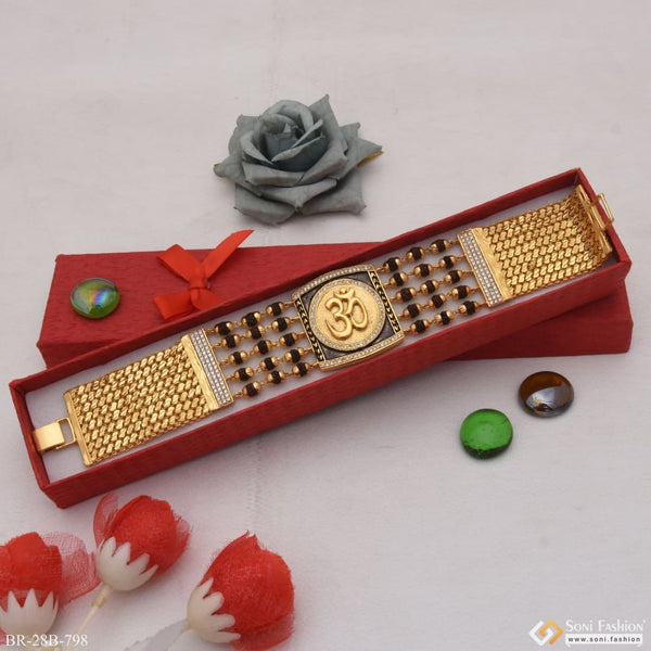 Om With Diamond Gorgeous Design Gold Plated Rudraksha Bracelet - red box with gold bracelet and red rose