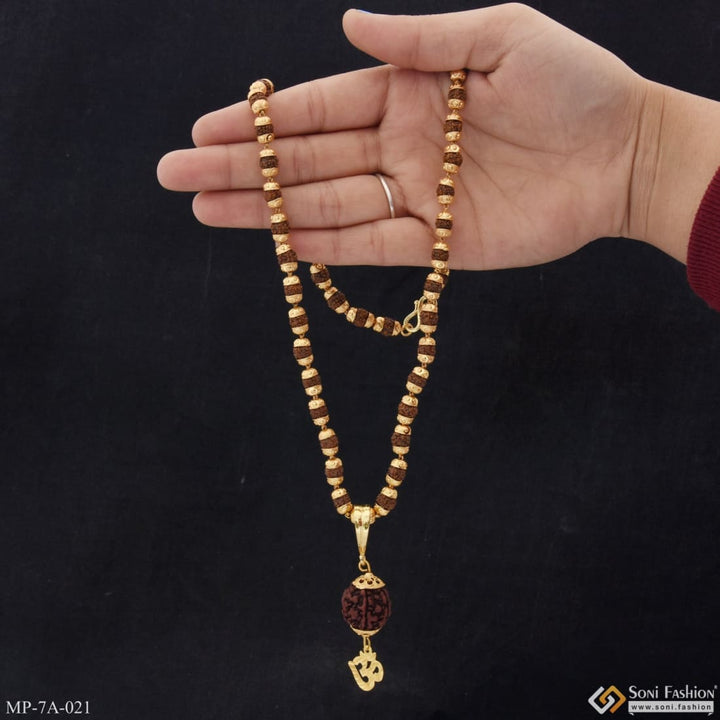 Hand holding a rosary with a cross - Om With Paro Fancy Design Gold Plated Rudraksha Mala With Pendant