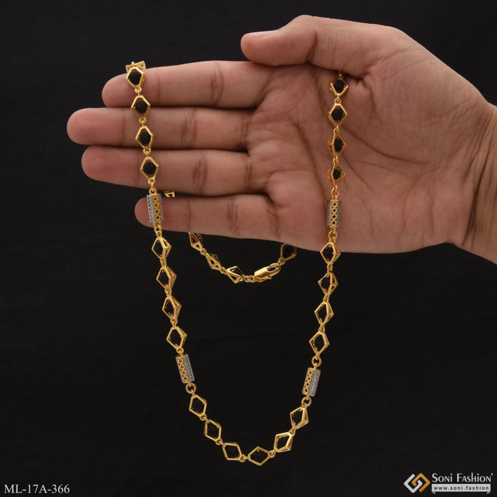 Gold chain with black stones held in hand - Popular Design Gorgeous Rudraksha Mala.