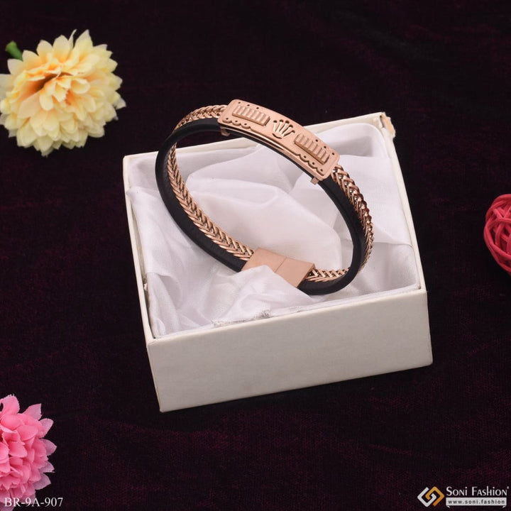 Stylish rose gold bracelet with rose design on leather background