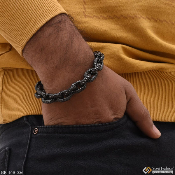 Man wearing silver and black bracelet with chain - Ring Into Ring Attention-Getting Design B556