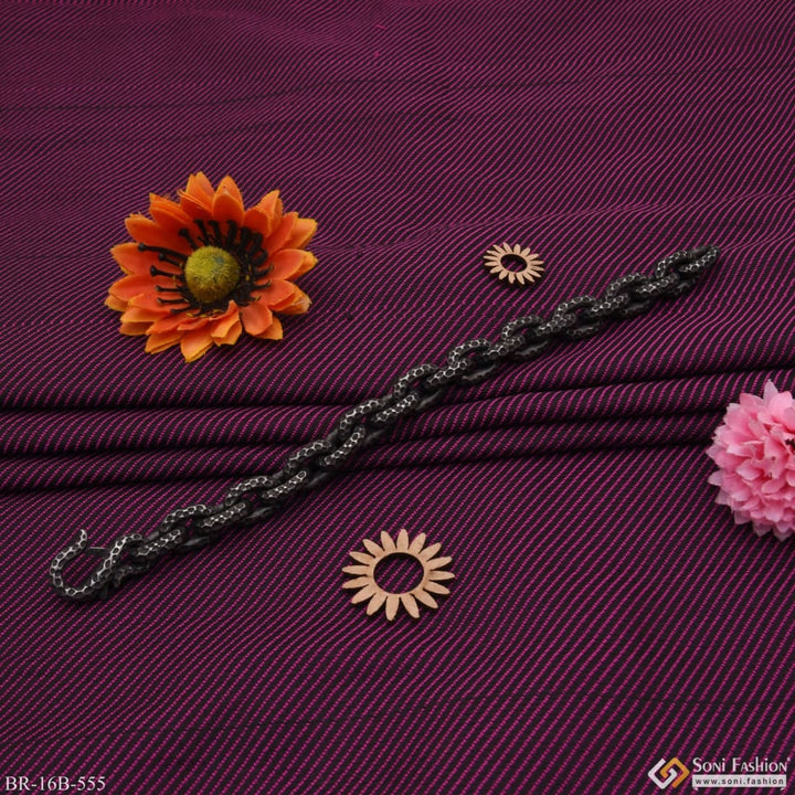 Black and pink flowers on purple background - Ring Into Ring Style B555 Bracelet.