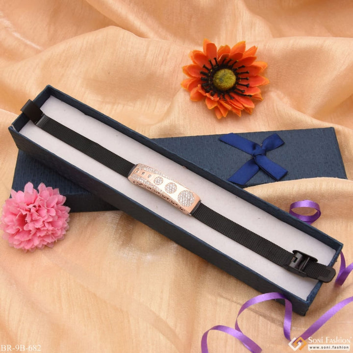 Rose gold bracelet with black box, gold bow, and flower design - Style B682