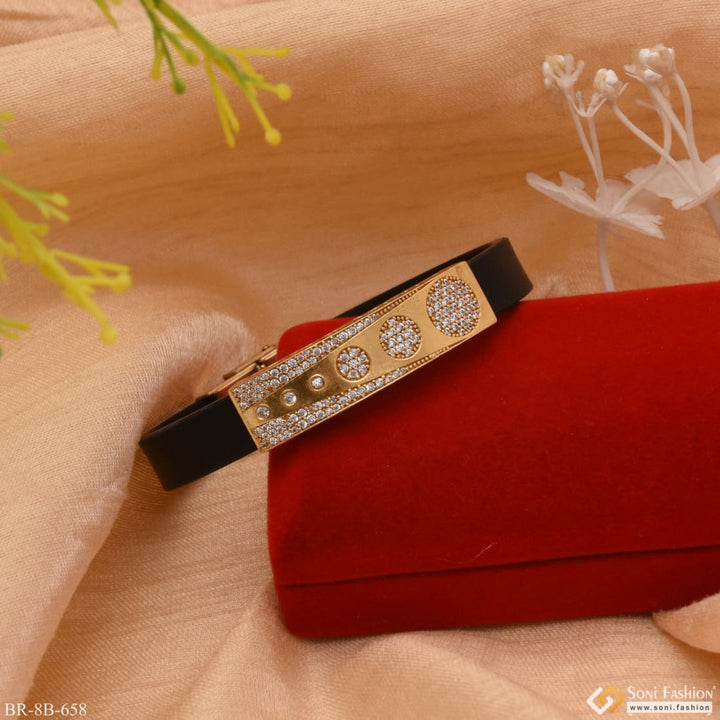 Red velvet bag with gold ring on Round With Diamond Finely Detailed Design Gold Plated Rubber Bracelet - Style B658