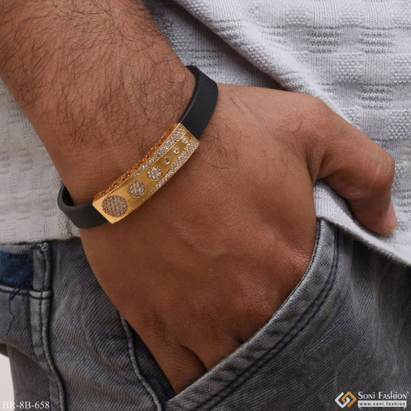 Gold plated hip hop bracelet with finely detailed diamond design.