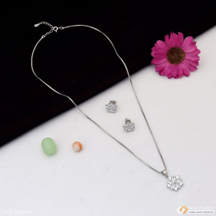 Silver necklace set with diamond earrings and flower on table - Style A449