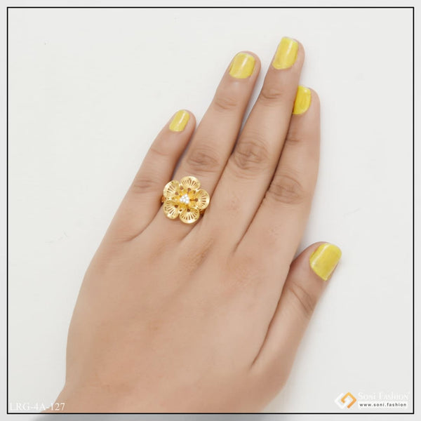 Woman’s hand with yellow nails wearing Unique Diamond Eye-Catching Design Gold Plated Ring for Ladies - Style LRG-127